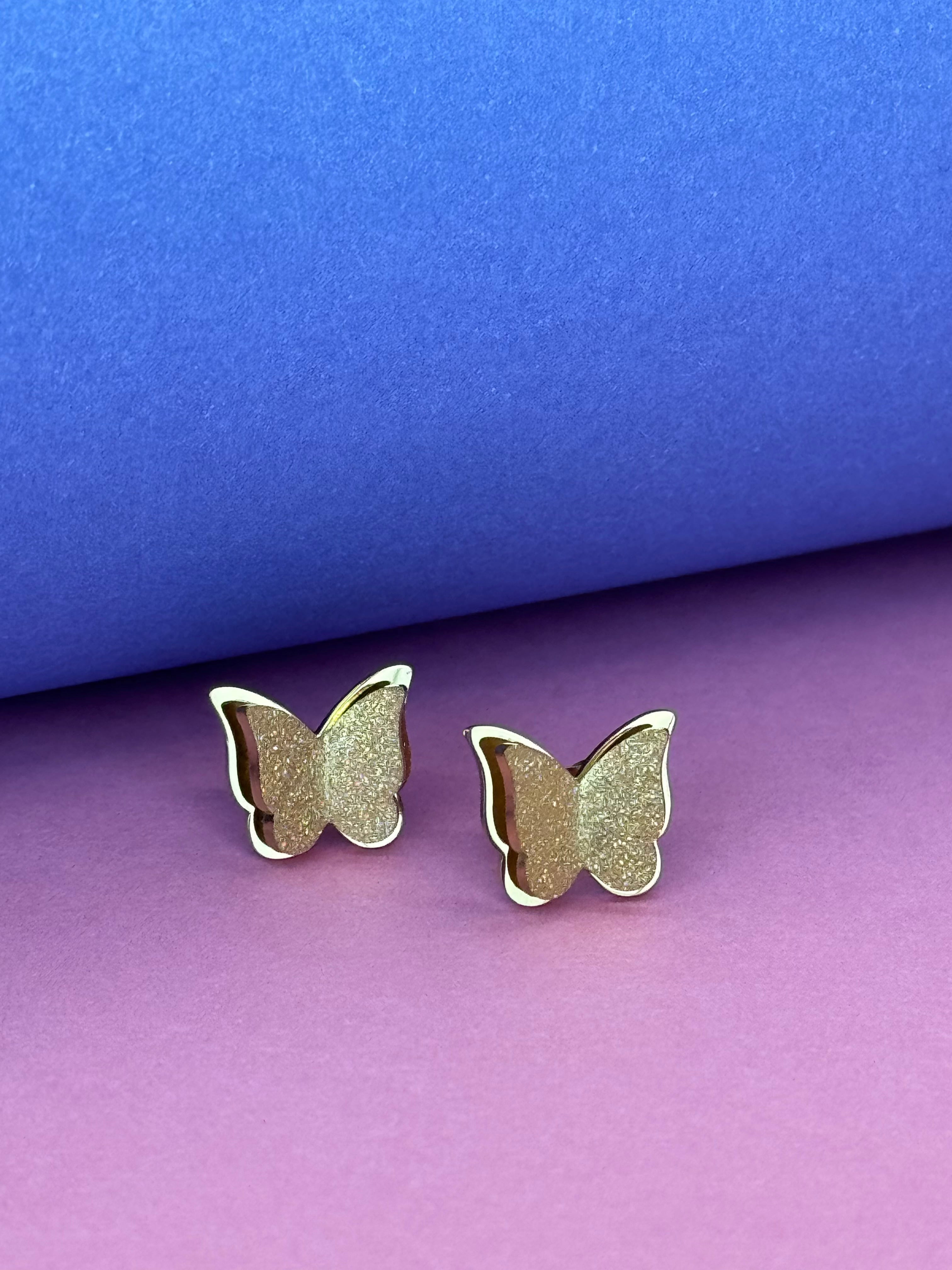 Clous d'oreilles papillons