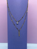Collier double avec pendentifs