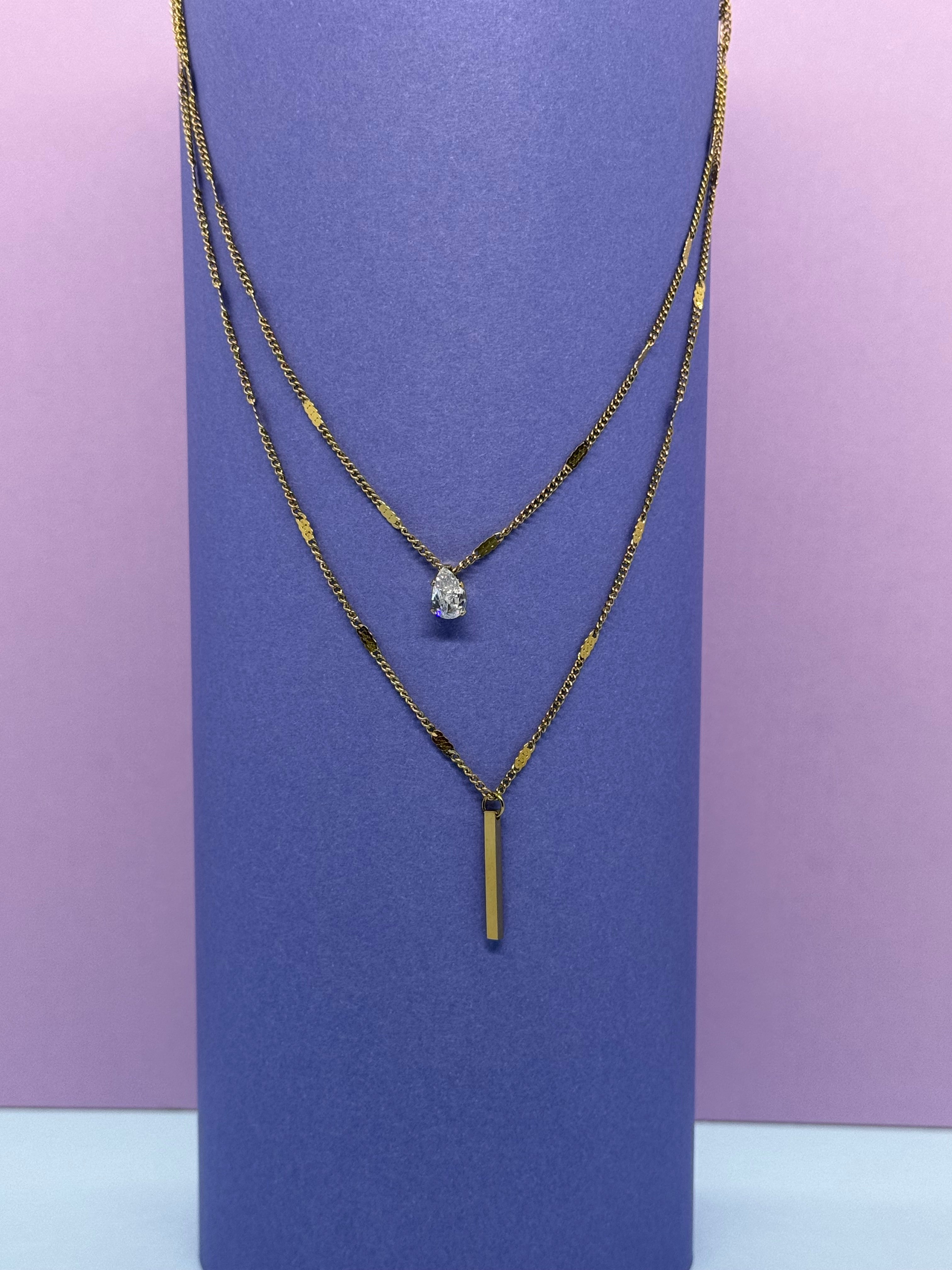 Collier double avec pendentifs